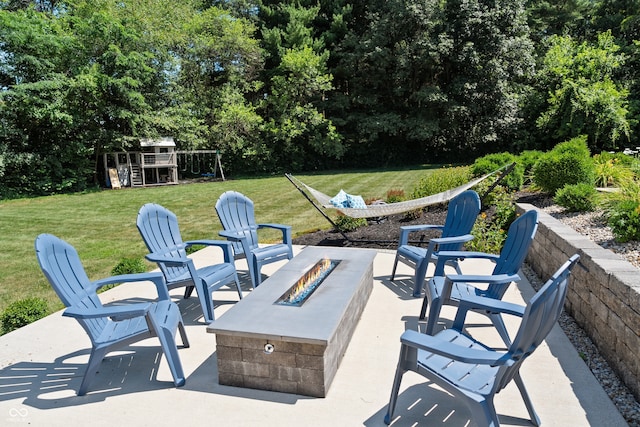 view of patio / terrace with a fire pit