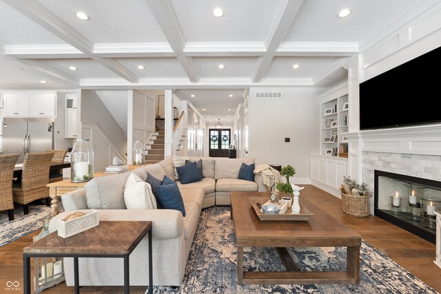 living room featuring coffered ceiling, beamed ceiling, dark hardwood / wood-style floors, and crown molding