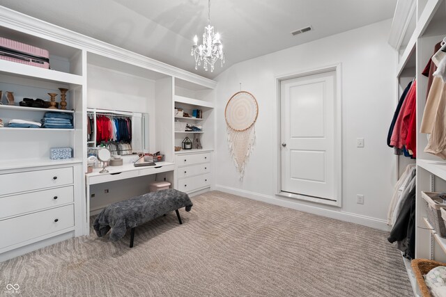 office area featuring light carpet, an inviting chandelier, and built in features