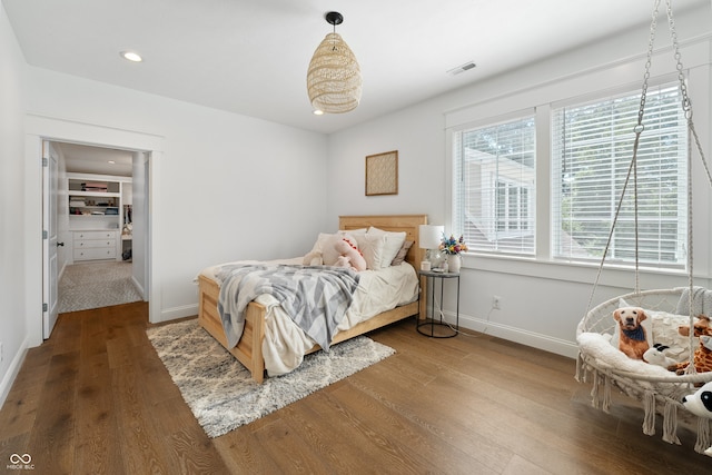 bedroom featuring hardwood / wood-style floors