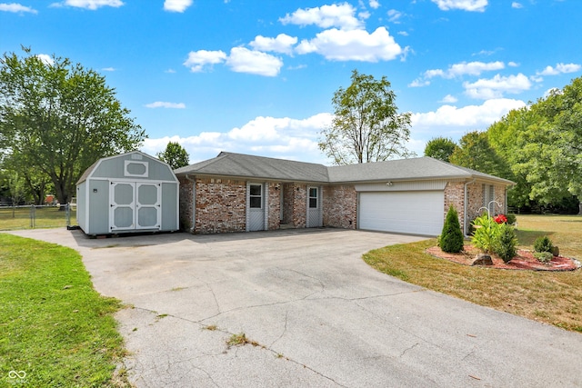 single story home with a front lawn and a garage