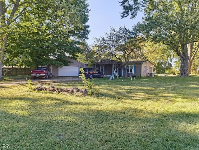 view of yard with a garage