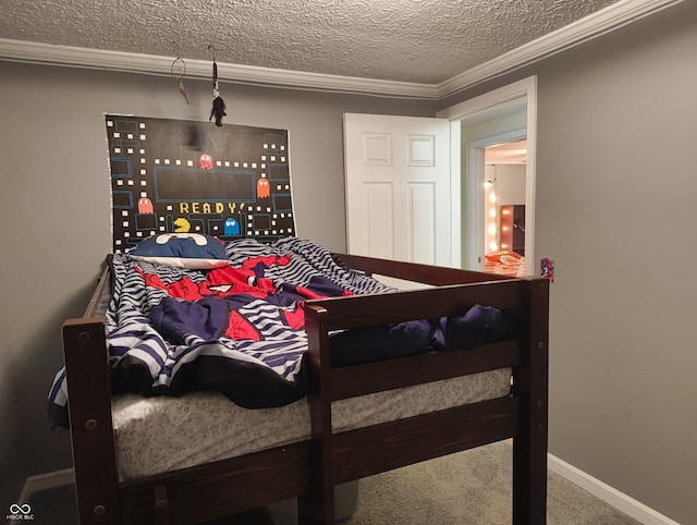 carpeted bedroom featuring ornamental molding and a textured ceiling