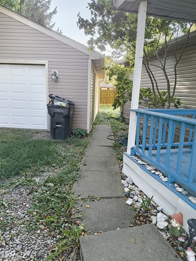 view of property exterior featuring a garage