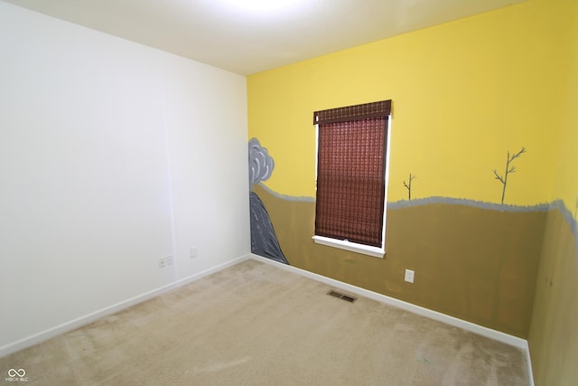 empty room featuring carpet floors