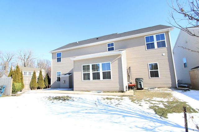 view of snow covered house