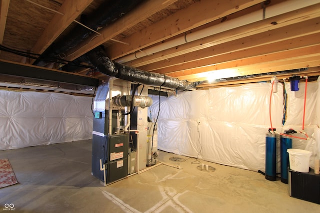 basement featuring heating unit