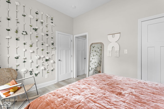 bedroom featuring light hardwood / wood-style flooring