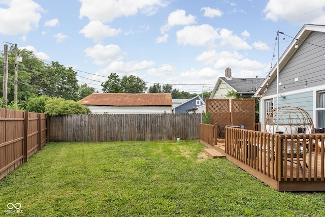 view of yard featuring a deck