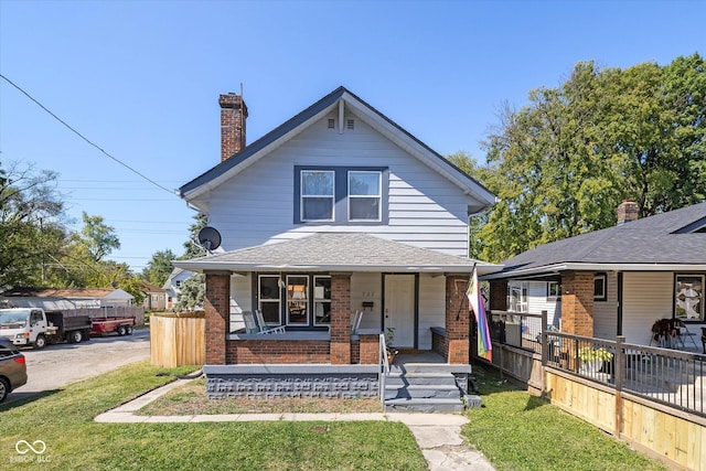 bungalow-style home with a porch