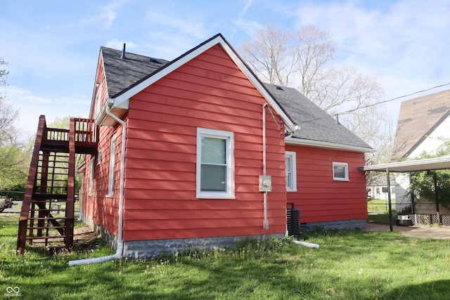 view of home's exterior featuring a lawn