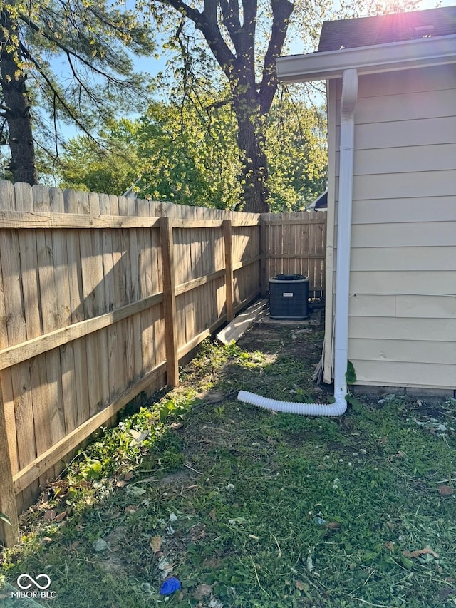 view of yard featuring central AC