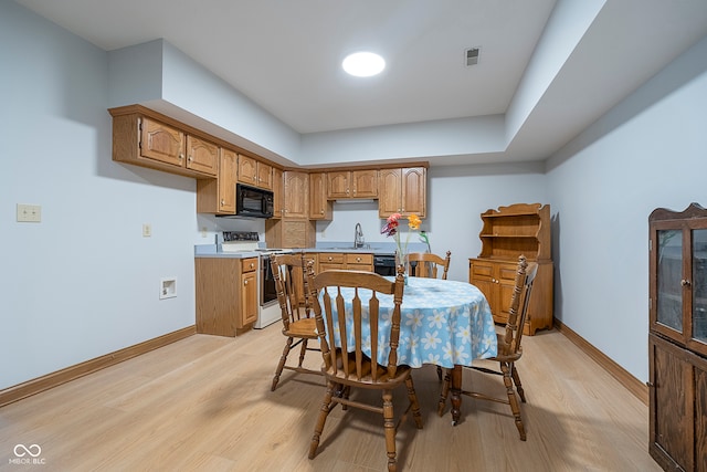 dining area featuring light hardwood / wood-style floors