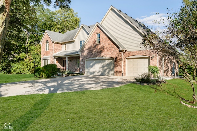 view of front facade featuring a garage and a front lawn