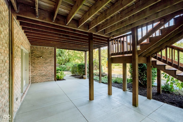 view of patio with a wooden deck