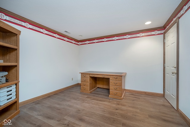 unfurnished office with light wood-type flooring