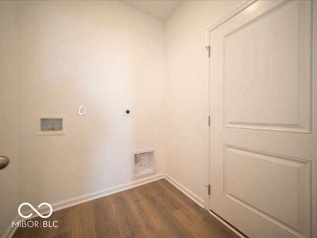 laundry area featuring laundry area, washer hookup, baseboards, dark wood finished floors, and electric dryer hookup