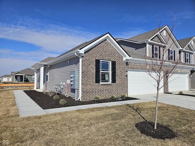 view of home's exterior with concrete driveway and brick siding