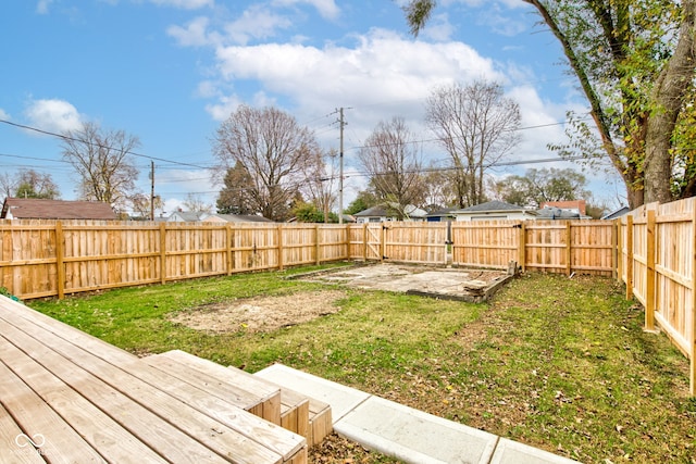 view of yard featuring a wooden deck