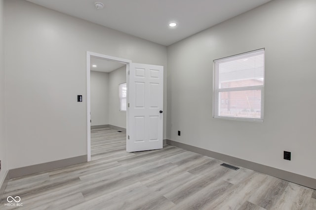 empty room featuring light hardwood / wood-style floors