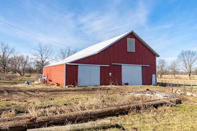 view of outdoor structure with a rural view