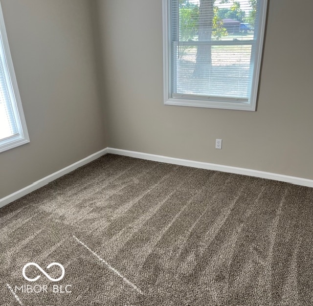 view of carpeted spare room