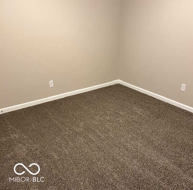 empty room featuring carpet floors