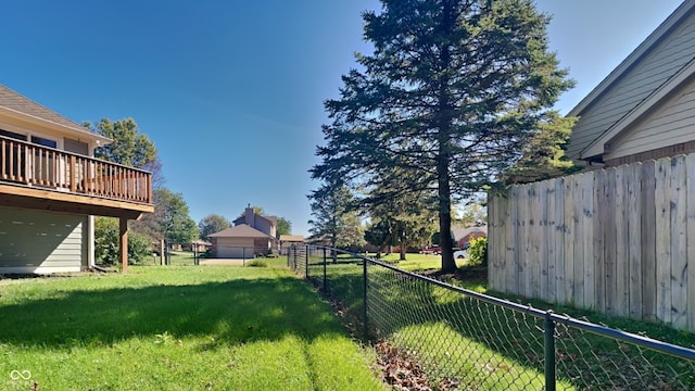 view of yard with a wooden deck