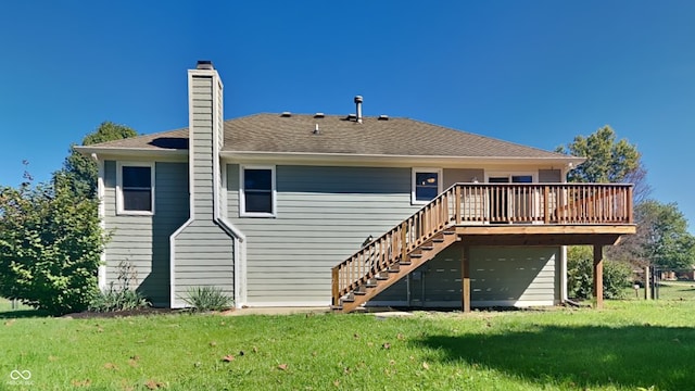 back of property with a wooden deck and a lawn