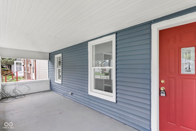 view of patio featuring a porch