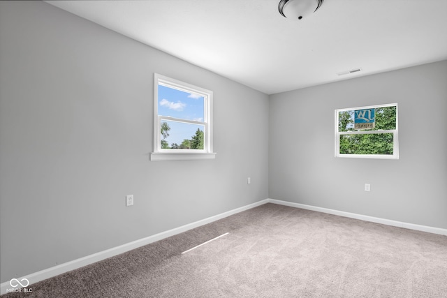 view of carpeted spare room