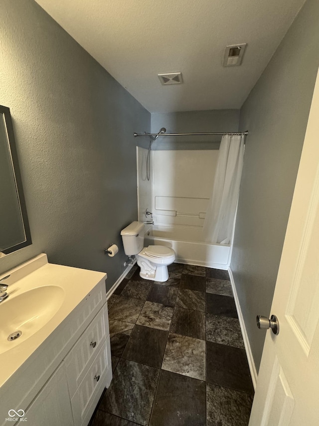 2307 Blackthorn Dr, Franklin, IN 46131 - full bath featuring baseboards, toilet, shower / tub combo, stone finish flooring, and vanity