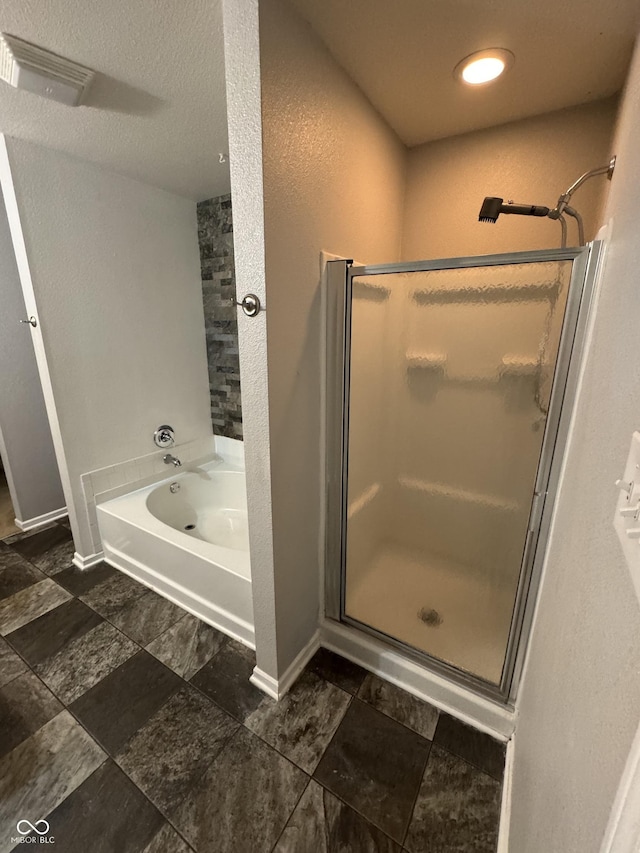 2307 Blackthorn Dr, Franklin, IN 46131 - full bath with a stall shower, a garden tub, and baseboards