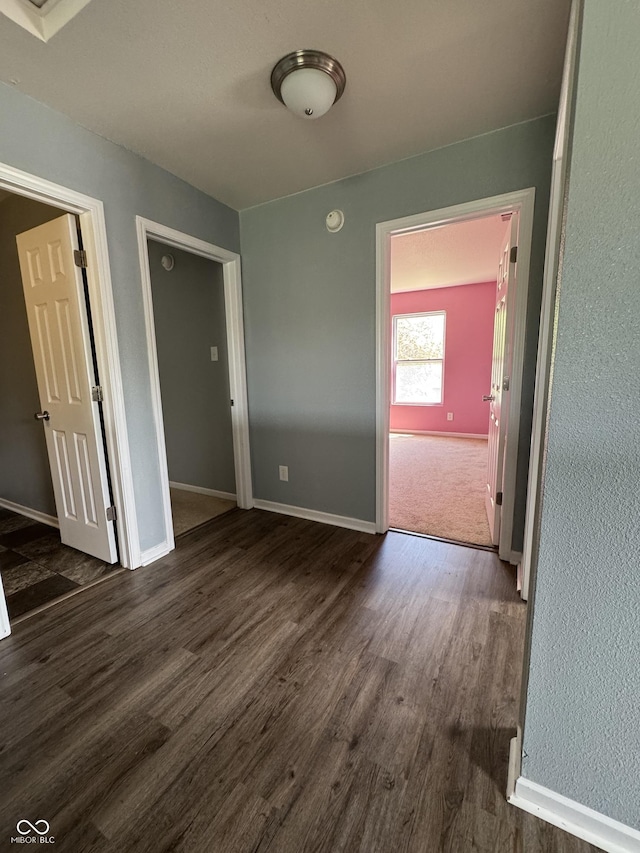 2307 Blackthorn Dr, Franklin, IN 46131 - empty room with dark wood-style floors and baseboards