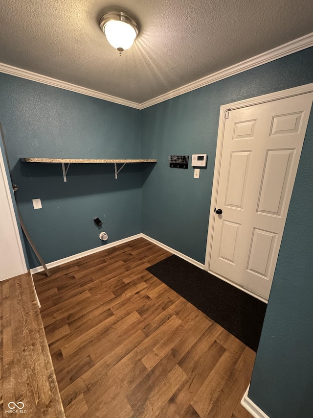 2307 Blackthorn Dr, Franklin, IN 46131 - laundry room featuring ornamental molding, a textured ceiling, wood finished floors, and baseboards