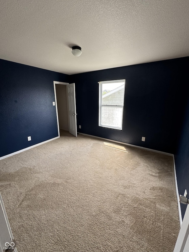 2307 Blackthorn Dr, Franklin, IN 46131 - unfurnished room with carpet flooring, a textured ceiling, and baseboards