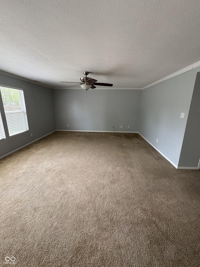 2307 Blackthorn Dr, Franklin, IN 46131 - unfurnished room with crown molding, ceiling fan, dark colored carpet, a textured ceiling, and baseboards