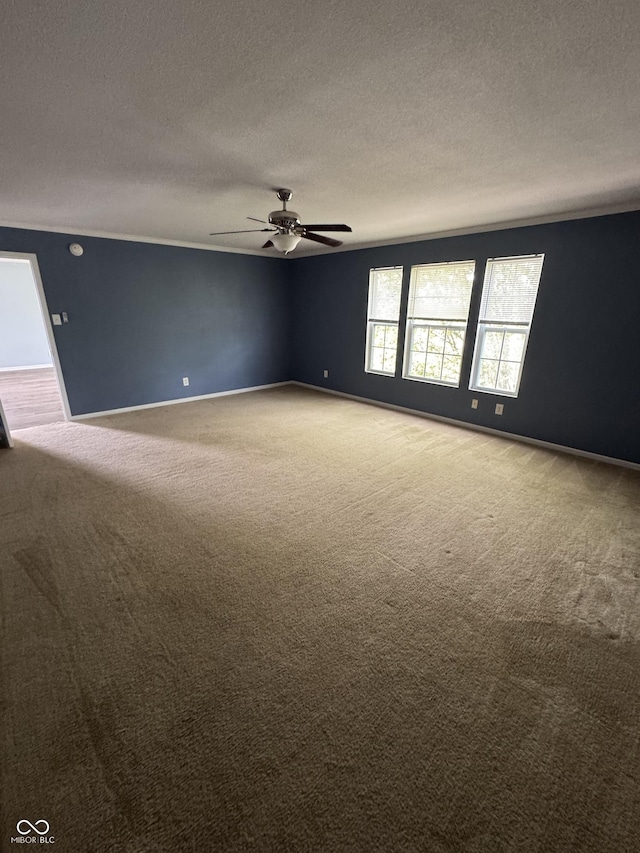 2307 Blackthorn Dr, Franklin, IN 46131 - carpeted empty room featuring a ceiling fan, a textured ceiling, and baseboards