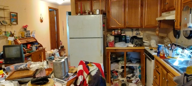 kitchen featuring white refrigerator