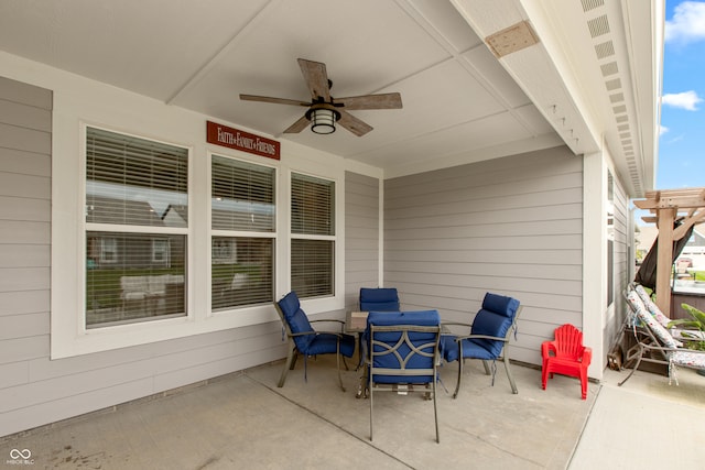 view of patio with ceiling fan