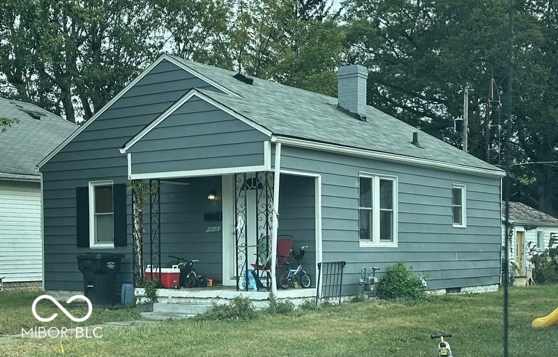 exterior space with a front lawn