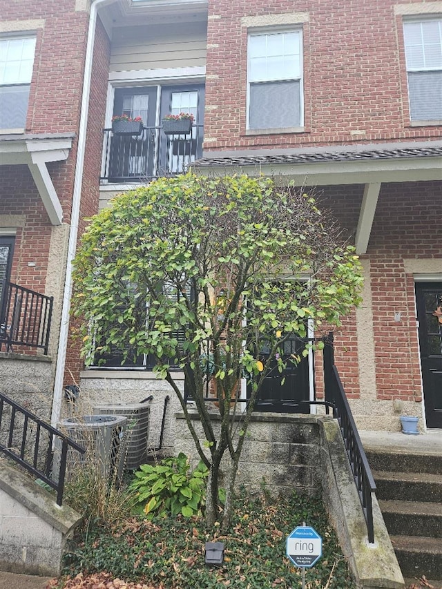 view of front facade with central air condition unit