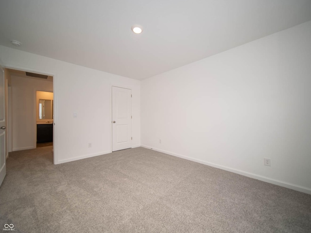 spare room with carpet flooring