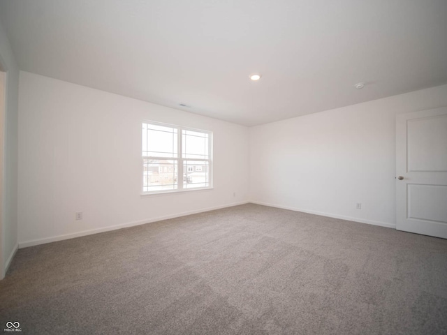 view of carpeted spare room