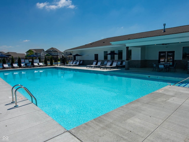 view of swimming pool featuring a patio