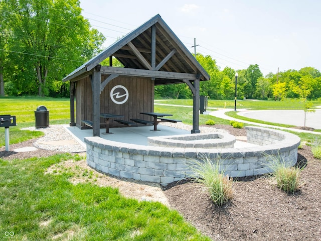 view of property's community featuring a gazebo and a lawn