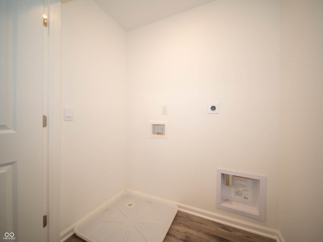 laundry room featuring washer hookup, dark hardwood / wood-style flooring, and electric dryer hookup