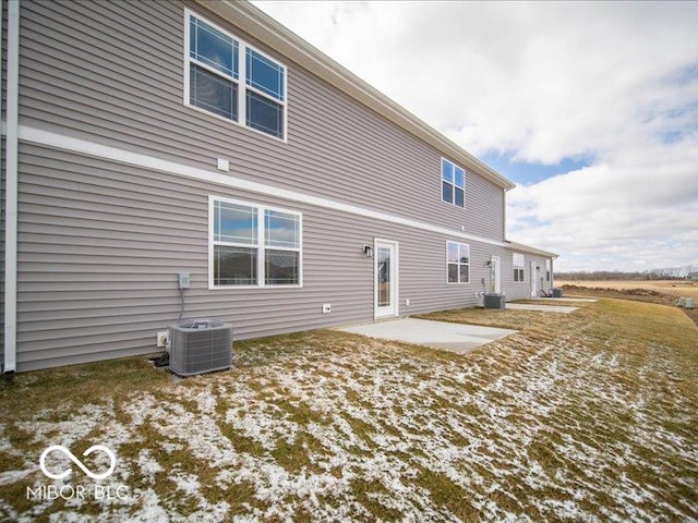 back of house featuring a patio area and central AC