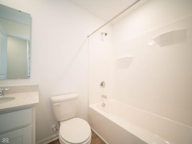 full bathroom featuring vanity, toilet, wood-type flooring, and shower / bathing tub combination