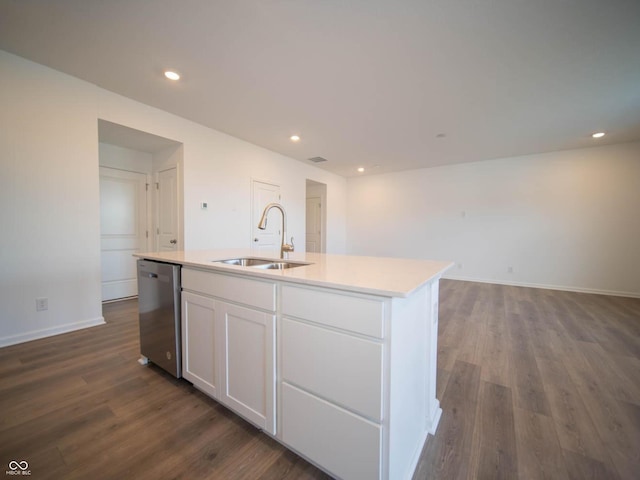 kitchen with dishwasher, dark hardwood / wood-style flooring, sink, white cabinetry, and a kitchen island with sink